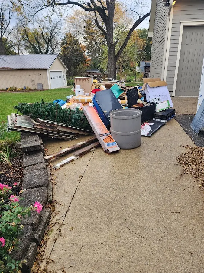 Dumpster being loaded with debris for Residential Dumpster Rental in Nevada City